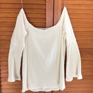 Off the shoulder bell-sleeved white top